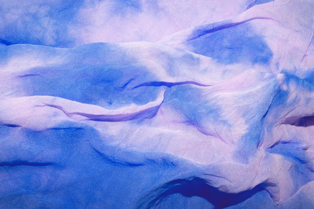 close up of blue and white textile