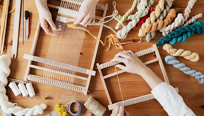 What are warp and weft in textile weaving