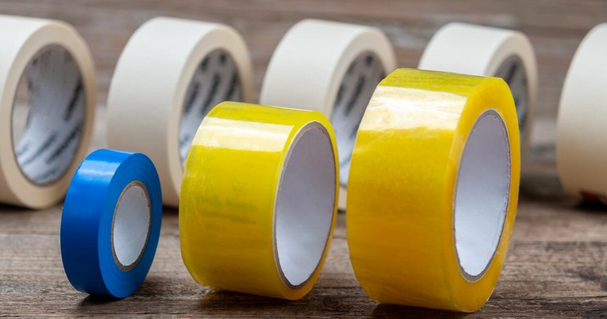 stotch tape,duct tape and masking tape on the wood surface